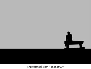 The Silhouette Of Man Sitting Alone With Grey Sky, Concept Of Lonely, Sad, Alone, Person Space/ Single Woman On Valentine