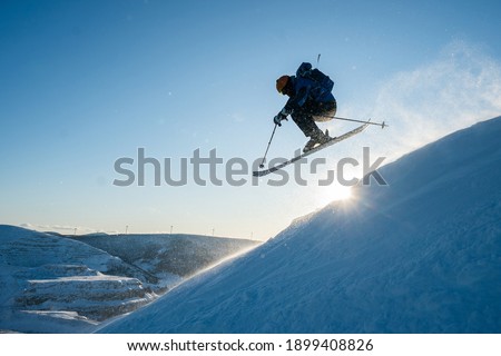 Silhouette of a man skiing in the Chic Chocs in Quebec Canada