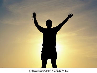 silhouette of a man at sunset