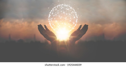 Silhouette a man use hand holding line circle online social media networking, sunset backgrounds, futuristic technology concept.