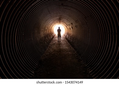 Similar Images, Stock Photos & Vectors of silhouette in a communication ... Silhouette Man Walking Tunnel