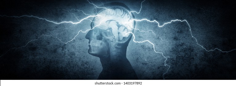 Silhouette of a man's head with x-rayed head and lightning coming out of the brain. Conceptual idea and symbol of the work of the brain, thinking, power of mind. 