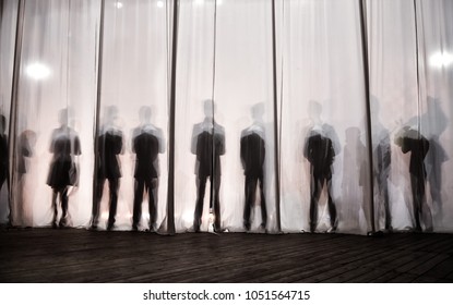 
The Silhouette Of The Men Behind The Curtain In The Theater On Stage, The Shadow Behind The Scenes Is Similar To The White And Black Piano Keys.