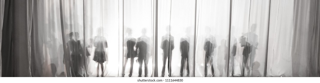 The Silhouette Of The Men Behind The Curtain In The Theater On Stage, The Shadow Behind The Scenes Is Similar To The White And Black Piano Keys.