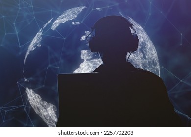 Silhouette of a military man in headphones at a laptop against the background of a digital globe of the earth, contour lighting. Concept: collection of confidential information, surveillance.