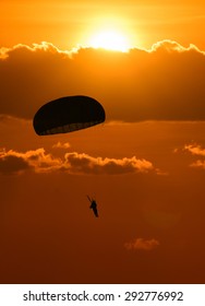 Silhouette Military Parachute Jump While Sunrise