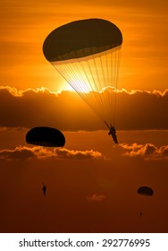 Silhouette Military Parachute Jump While Sunrise