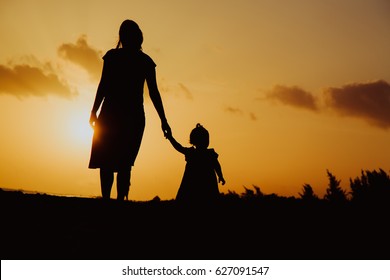 Silhouette Mother Daughter Walking On Beach Stock Photo 627091547 ...