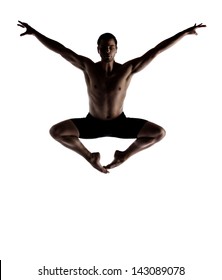 Silhouette Of An Muscular Adult Male Modern Contemporary Ballet Style Dancer. Dancer Is Wearing Black Ski Pants And Is Isolated On A White Background.