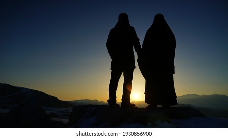 Silhouette Muslim Husband And Wife Photo. Ramadan Photo.