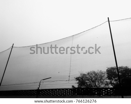 Similar – boy leaning on fence