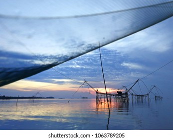 Silhouette Nets fishing at Noi Sea-Phatthalung, Thailand - Shutterstock ID 1063789205