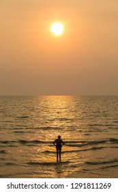 Silhouette Old Woman Lady Is Standing On The Beach And Sea With Happy Life After Retirement