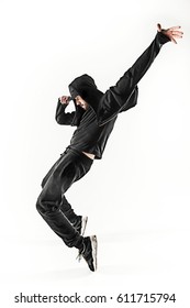 The Silhouette Of One Hip Hop Male Break Dancer Dancing On White Background