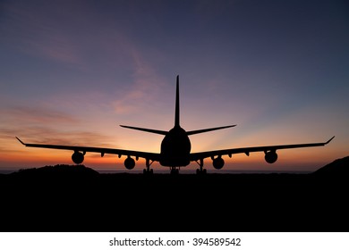  Silhouette Of  Passenger Aircraft, Airline On Beautiful Sunset Background