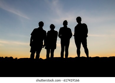 Silhouette People Posting During Sunset Stock Photo 617419166 ...