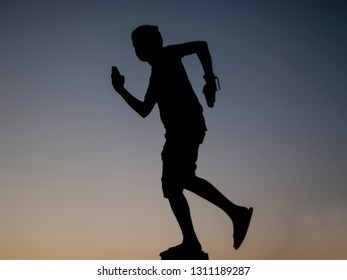 Silhouette Person Boy Running Towards Sunset Stock Photo 1311189287 ...