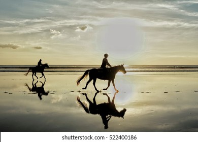 Silhouette Photo Of Horse Riding In The Evening Sunset Time , Dramatic Style