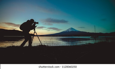 Silhouette Photographer With Fuji Mount - Powered by Shutterstock