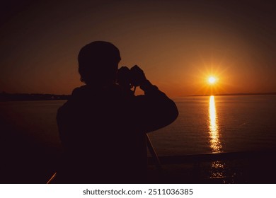 silhouette photographer sunset golden hour - Powered by Shutterstock