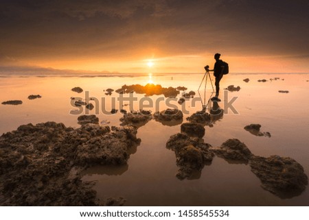 Similar – Image, Stock Photo Man with pipe in midnight sun at the fjord