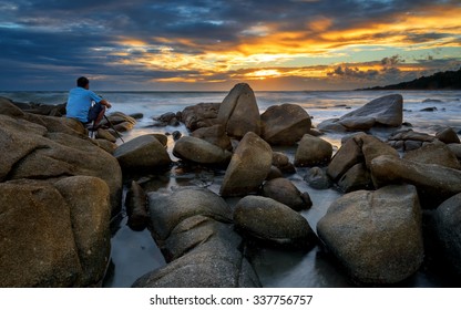 Silhouette of a photographers who shooting a sunset on the beach - Powered by Shutterstock