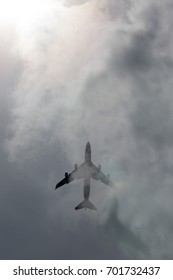 Silhouette Plane And Shadow On Cloud