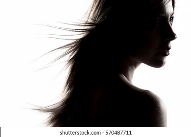 silhouette portrait of a beautiful caucasian girl 