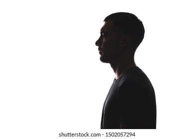 Silhouette Portrait Of Young European Man In Profile Isolated White Background