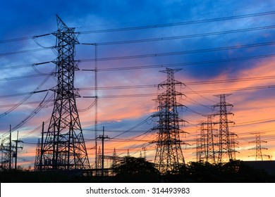 Silhouette Power Transmission Tower  During Twilight Time