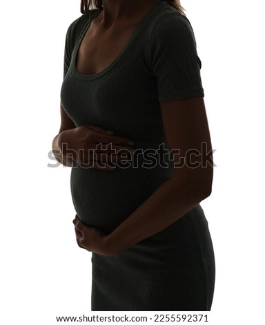 Silhouette of pregnant woman on white background. Breast cancer awareness concept