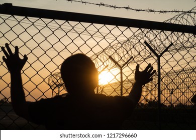 Silhouette Prisoner Behind Barbed Wire Fence Stock Photo 1217296660 