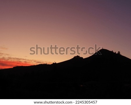 Silhouette of Puketapu mountain in Palmerston, Otago, New Zealand.
