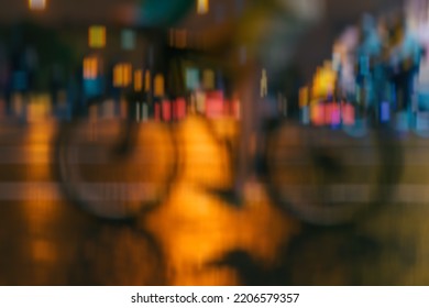 Silhouette Of Riding Cyclists On The City Roadway, Night Light, Bokeh, Abstract, Motion Blur, Golden Background