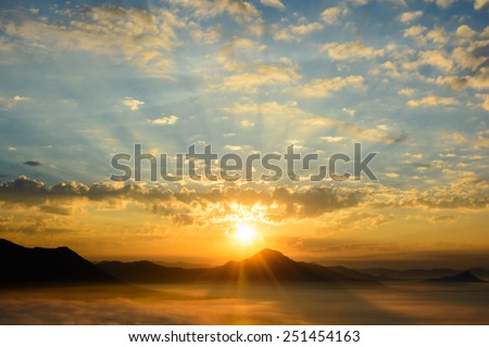 Silhouette Rising sun over the mountains in early morning