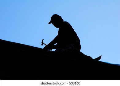 Silhouette Of Roofer