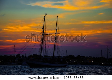 Similar – Silhouettes of the masts of a sailing ship