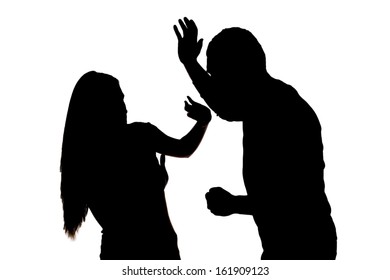 Silhouette Of  Scared Woman Protecting From Male Attack. Idea Of  Criminal Offence 