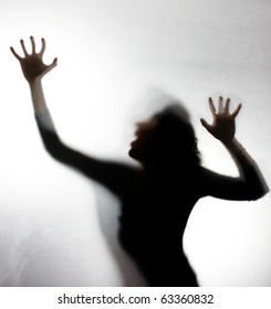 Silhouette Of A Screaming Woman