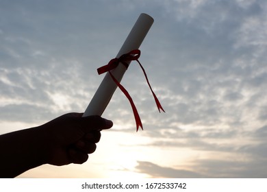silhouette scroll in selective focus during sunset. 