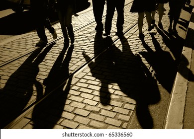 Silhouette And Shadows Of People Walking, Brick Pavement And Street Car Tracks, Focus On Shadows, Fisherman's Wharf, San Francisco, California,