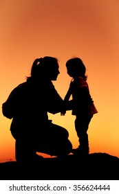 Download Mother Daughter Silhouette Images, Stock Photos & Vectors ...