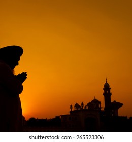 Silhouette Of Sikh Prayer At Temple, Amritsar, India