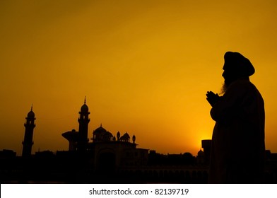 Silhouette Of Sikh Prayer At Temple, Amritsar, India