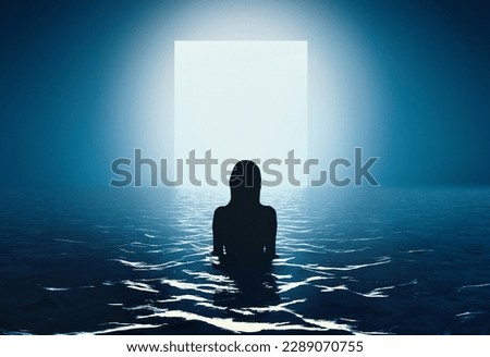 Silhouette of slim woman standing in ocean at night and moving to unknown white glowing space. Abstract design for wallpaper, background and banner. New world. Fantasy and futurism
