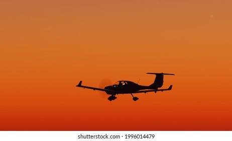 Silhouette Of A Small Plane At Sunset