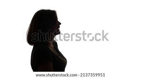silhouette of a smiling girls profile isolated on white background