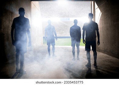 Silhouette of soccer teams facing field - Powered by Shutterstock