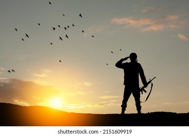 Silhouette of soldier against the sunrise. Concept - protection, patriotism, honor. Armed forces of Turkey, Israel, Egypt and other countries.
