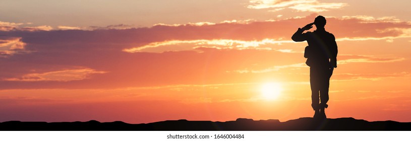 Silhouette Of A Soldier Saluting During Sunset - Shutterstock ID 1646004484